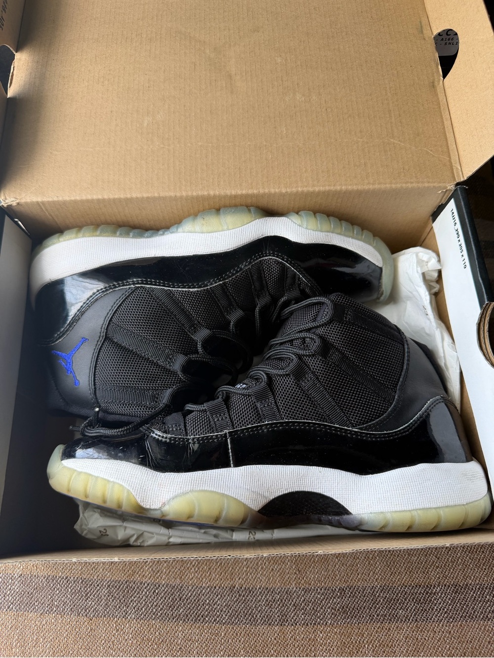 Air Jordan 11 Reto “Space Jam”